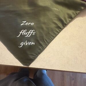 Olive Green “zero fluffs given” dog bandana.